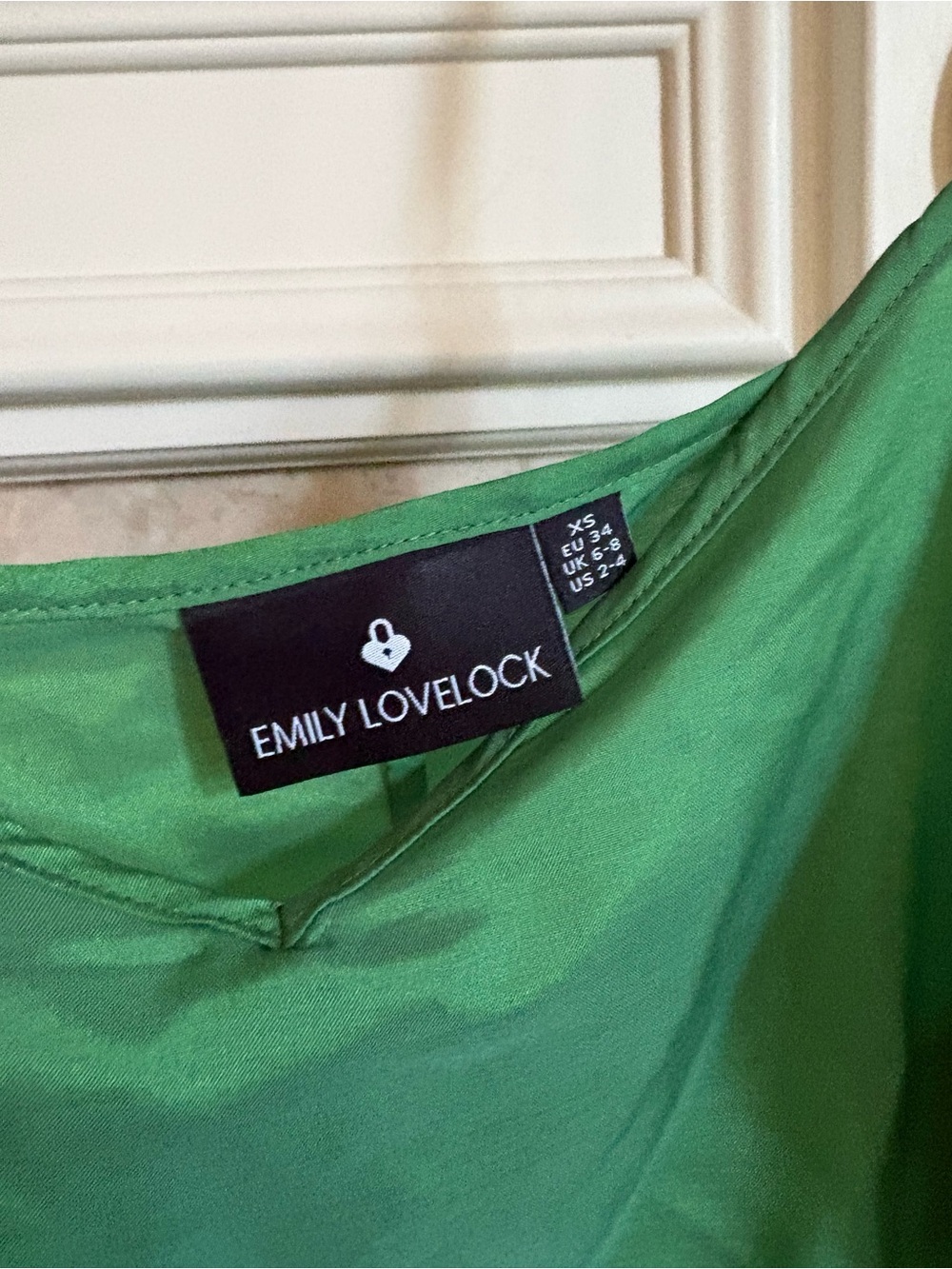 Emily Lovelock Green dress